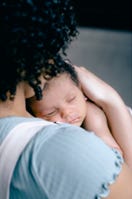 Women holding a baby