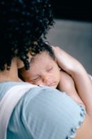 Women holding a baby