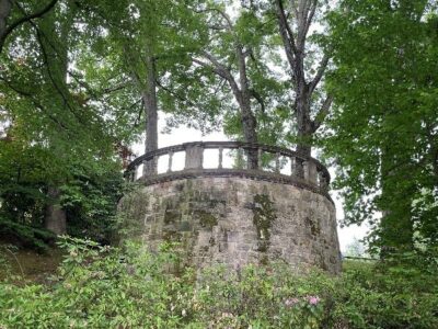 Round stone balcony in the woods